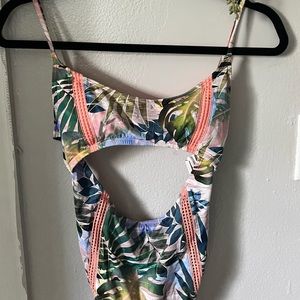 A beautiful and tropical one piece bathing suit